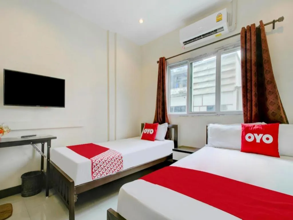 Bed in OYO 253 KK 11 Boutique Inn