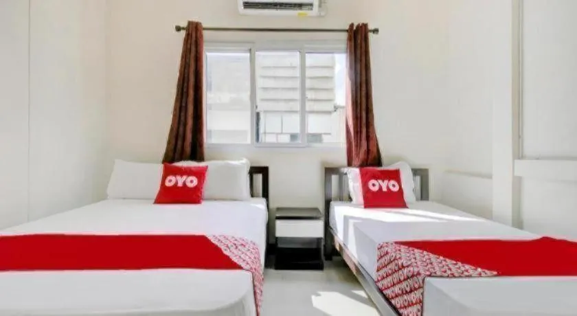 Bed in OYO 253 KK 11 Boutique Inn