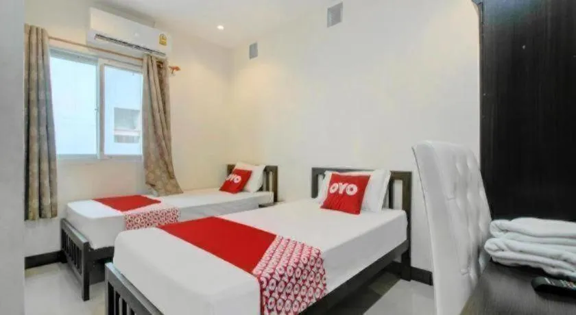 Bed in OYO 253 KK 11 Boutique Inn