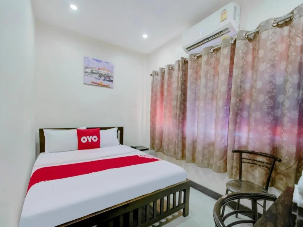 Bed in OYO 253 KK 11 Boutique Inn
