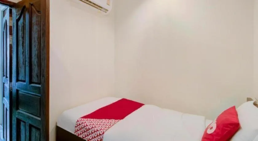 Bed in OYO 253 KK 11 Boutique Inn