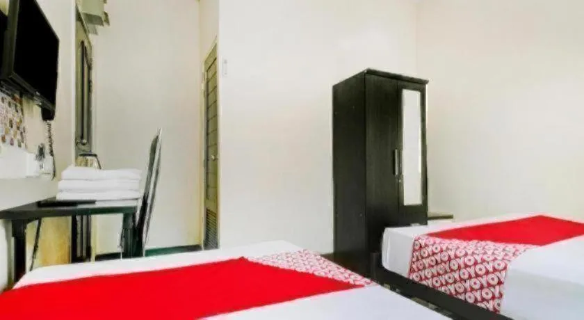 Bed in OYO 253 KK 11 Boutique Inn