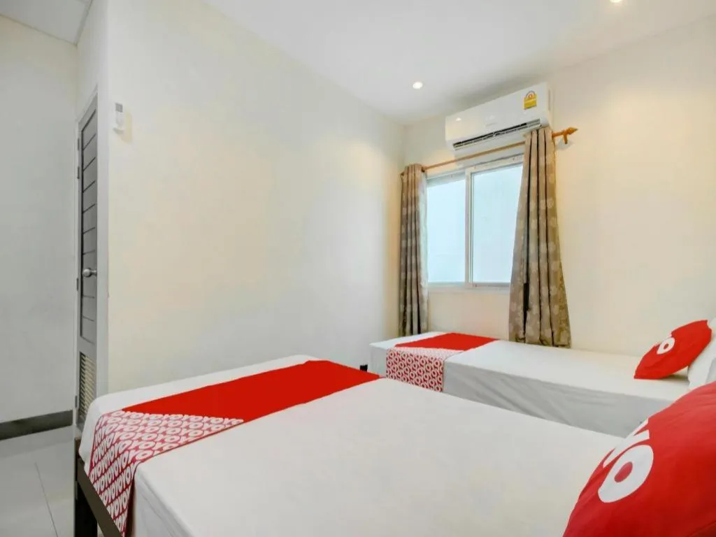 Bed in OYO 253 KK 11 Boutique Inn