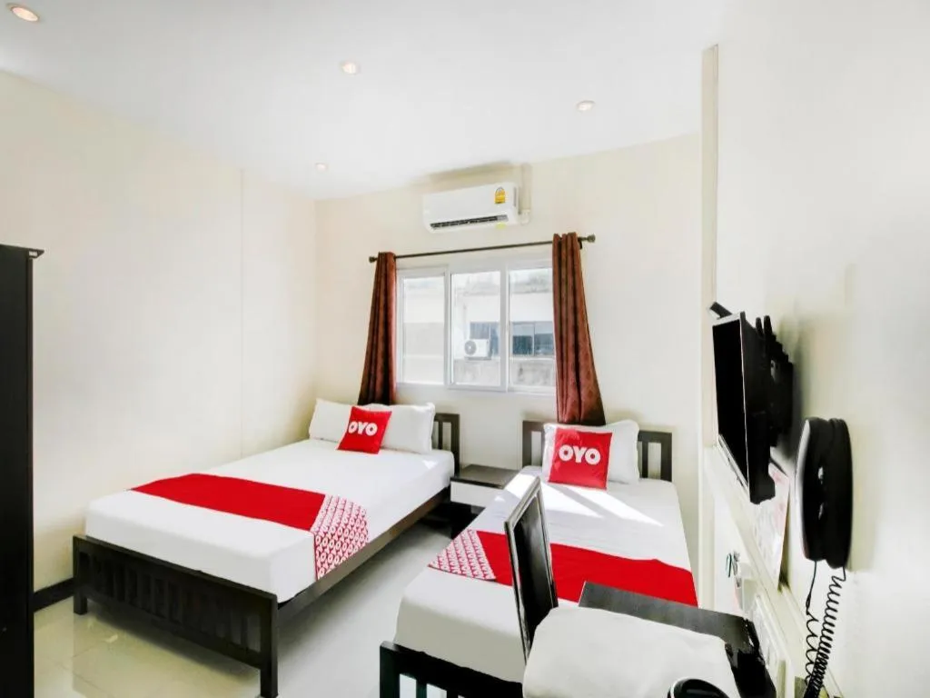 Bed in OYO 253 KK 11 Boutique Inn
