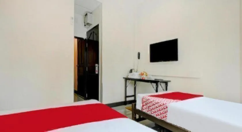Bed in OYO 253 KK 11 Boutique Inn