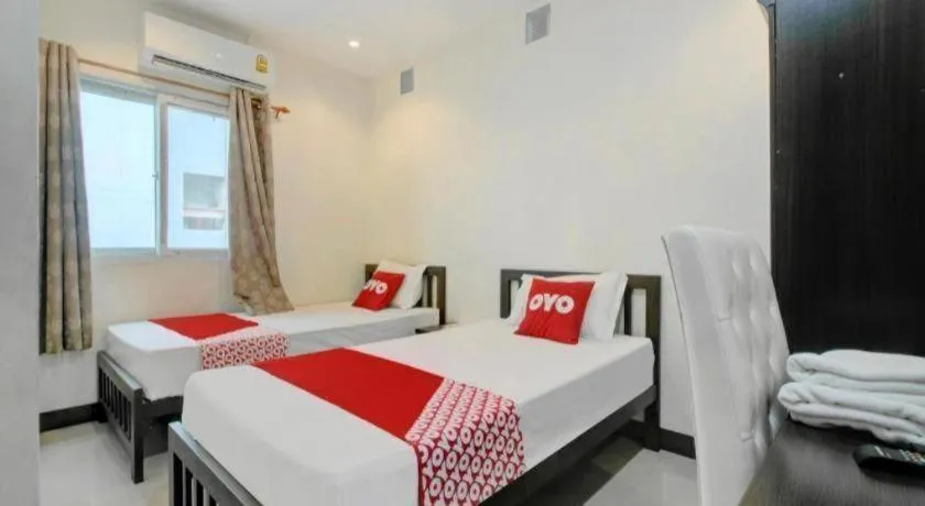 Bed in OYO 253 KK 11 Boutique Inn