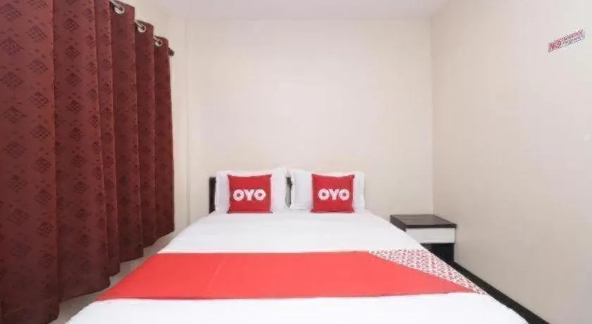 Bed in OYO 253 KK 11 Boutique Inn