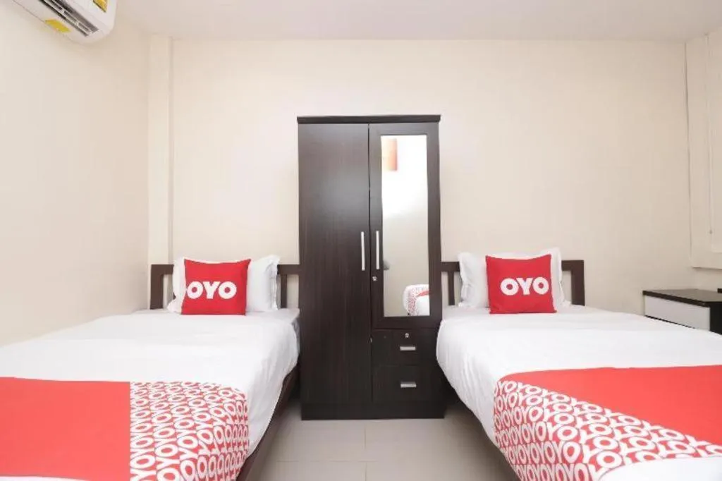 Bed in OYO 253 KK 11 Boutique Inn