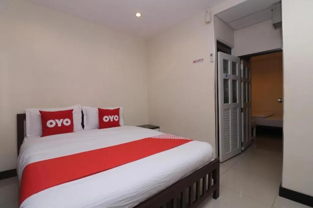 Bed in OYO 253 KK 11 Boutique Inn