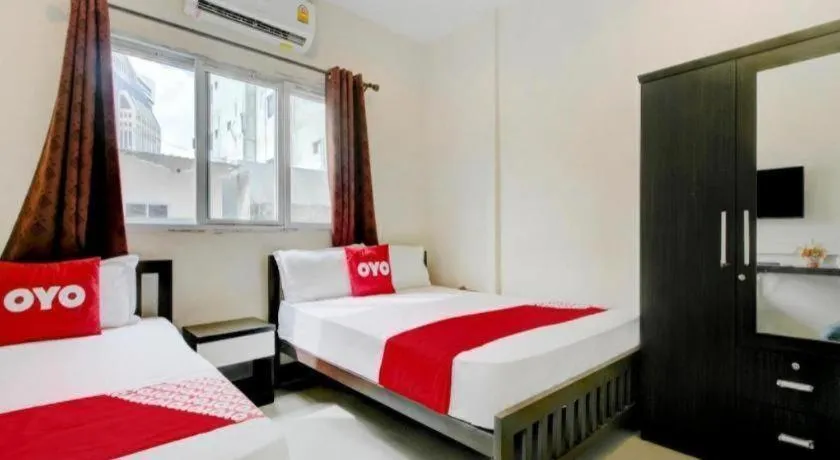 Bed in OYO 253 KK 11 Boutique Inn