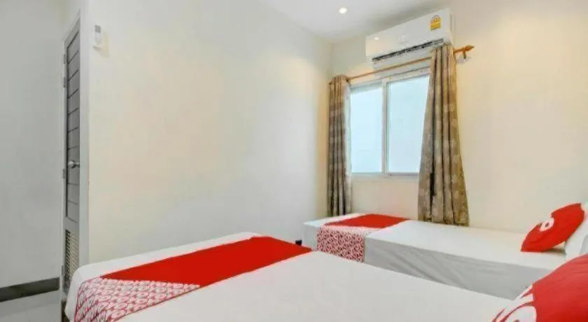 Bed in OYO 253 KK 11 Boutique Inn