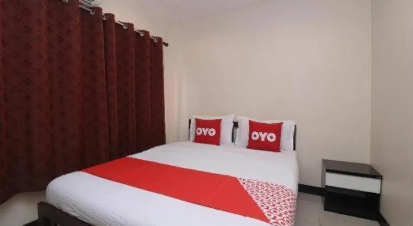 Bed in OYO 253 KK 11 Boutique Inn