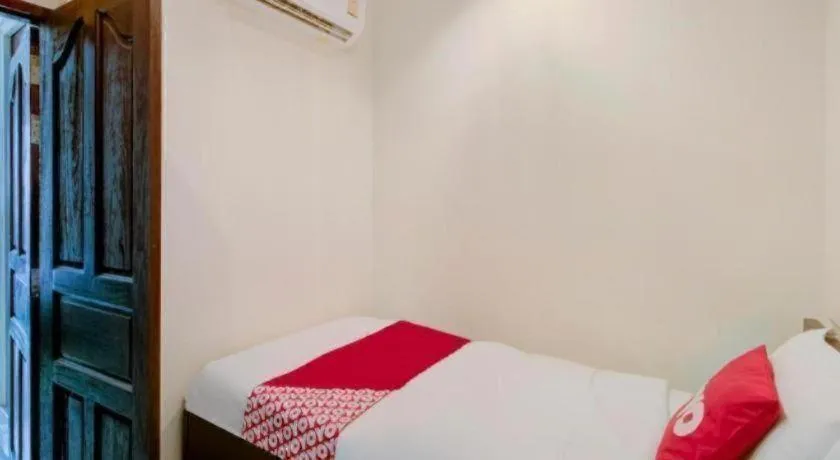 Bed in OYO 253 KK 11 Boutique Inn