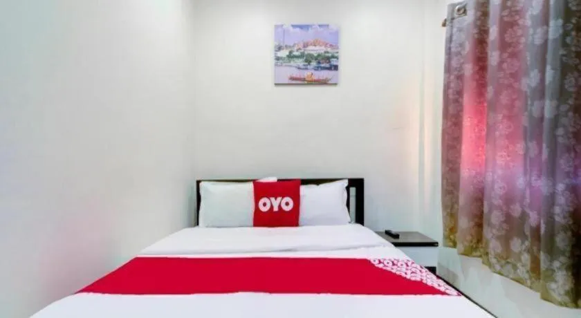 Bed in OYO 253 KK 11 Boutique Inn