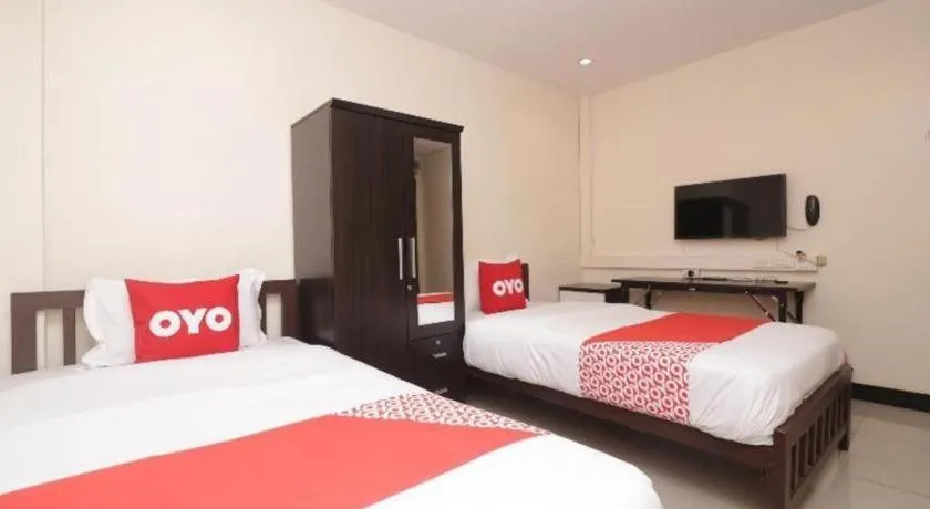 Bed in OYO 253 KK 11 Boutique Inn