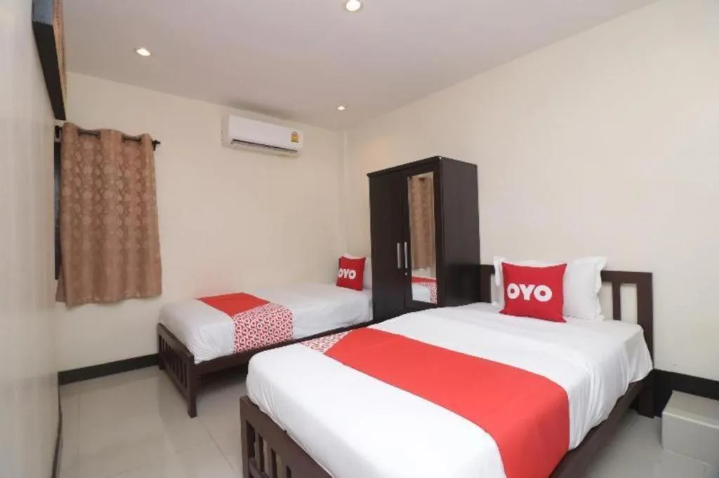 Bed in OYO 253 KK 11 Boutique Inn