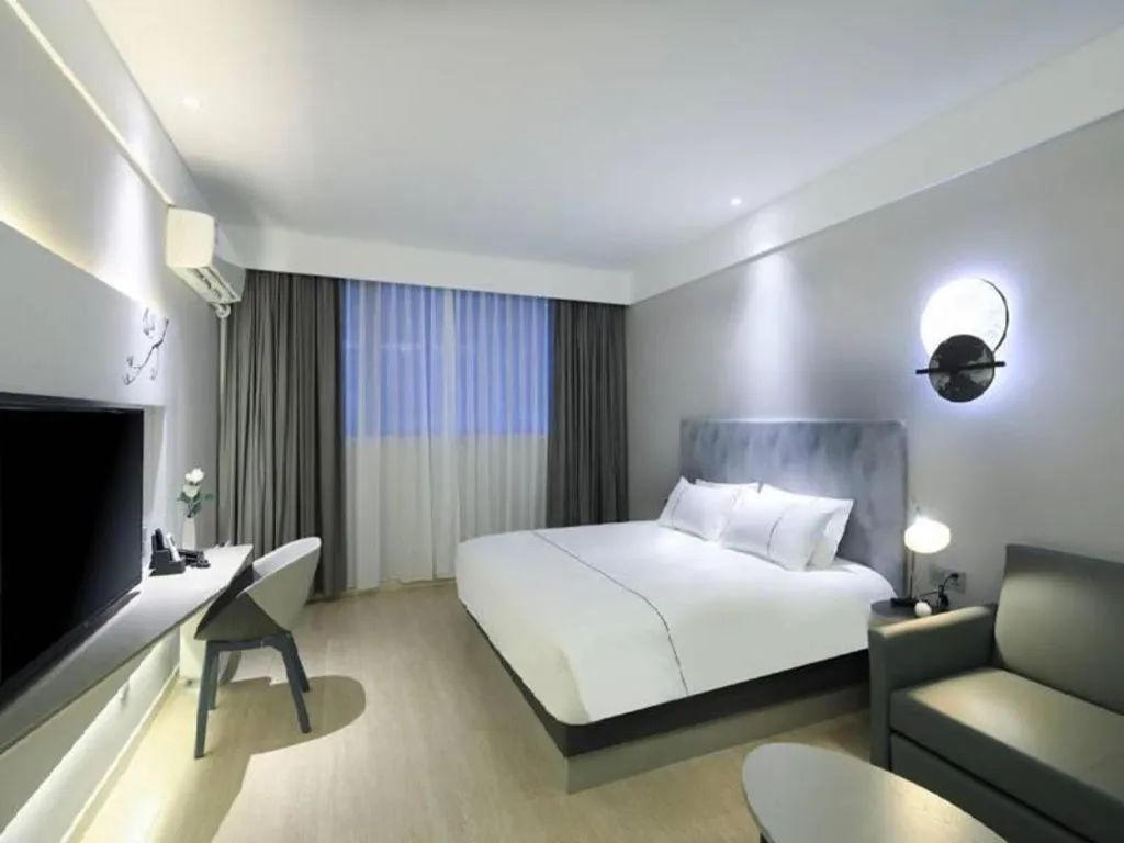 Bed in Magnotel Hotel·Shanghai Xintiandi