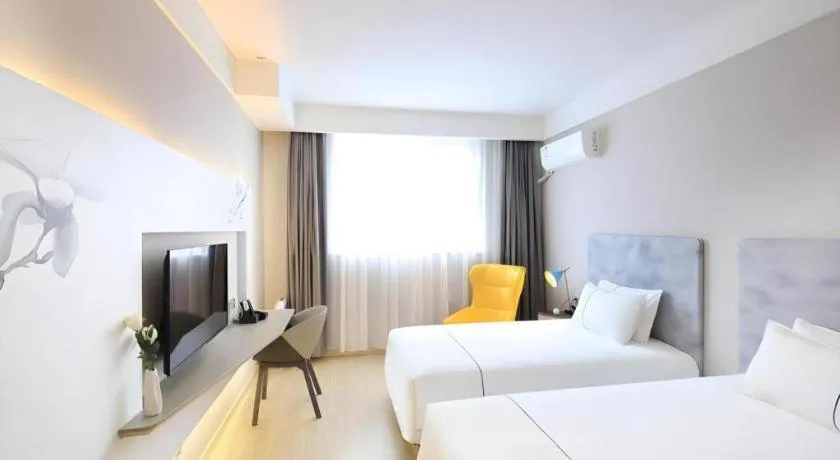 Bed in Magnotel Hotel·Shanghai Xintiandi