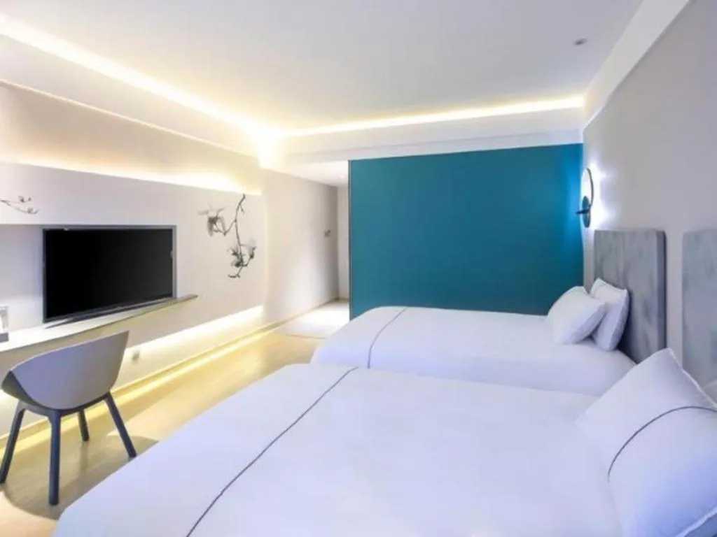 Bed in Magnotel Hotel·Shanghai Xintiandi