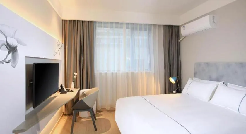 Bed in Magnotel Hotel·Shanghai Xintiandi