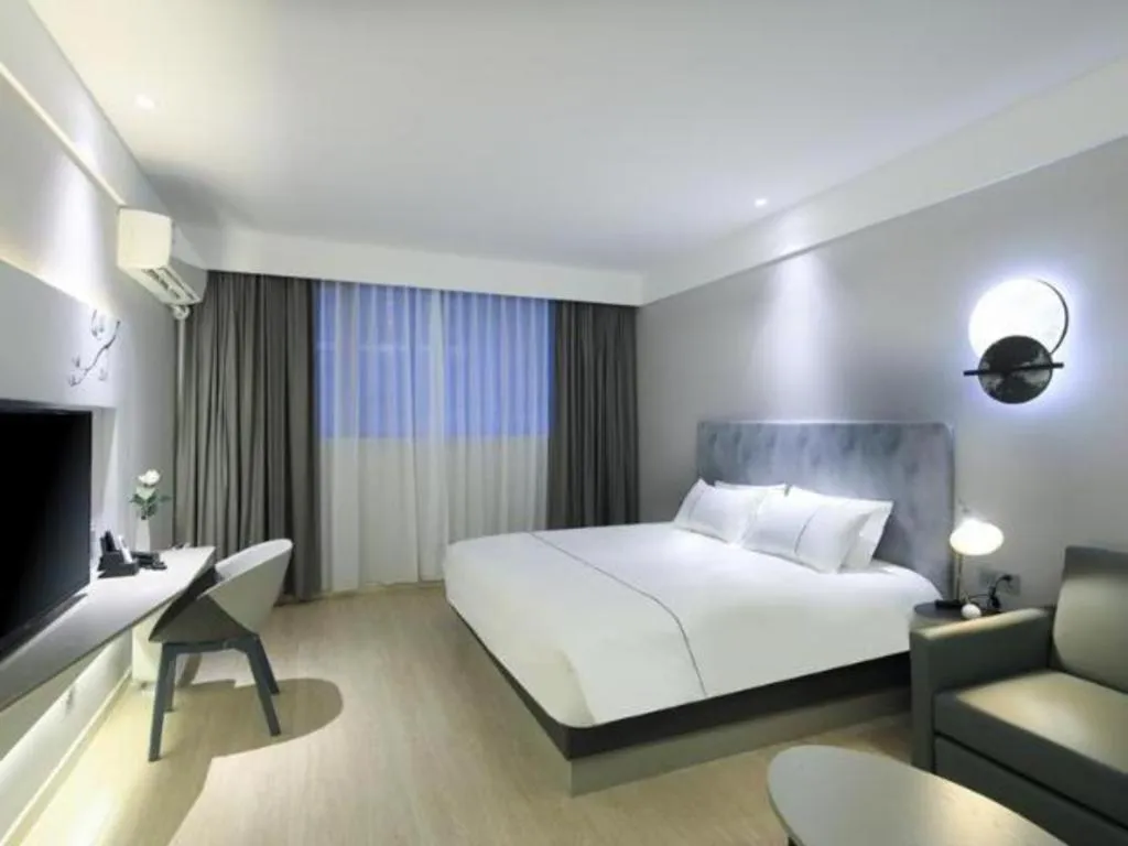 Bed in Magnotel Hotel·Shanghai Xintiandi