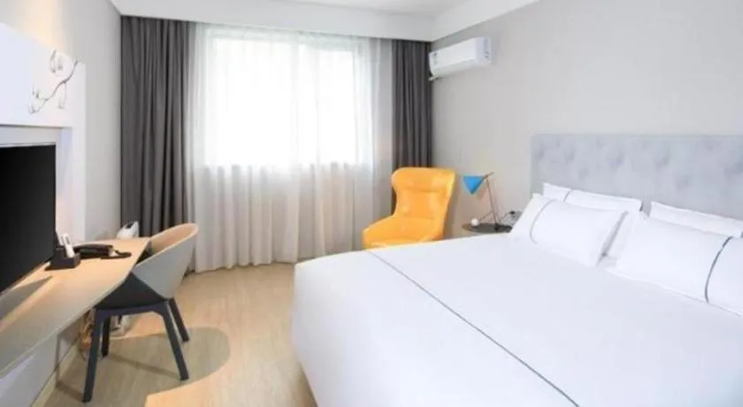 Bed in Magnotel Hotel·Shanghai Xintiandi