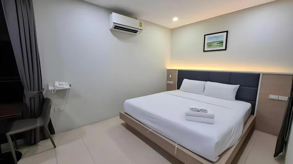 Bed in Sattahip 9 Boutique Hotel