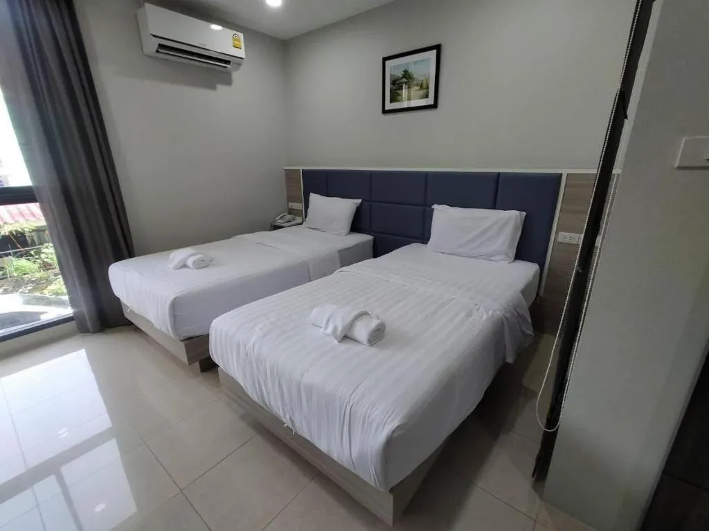 Bed in Sattahip 9 Boutique Hotel