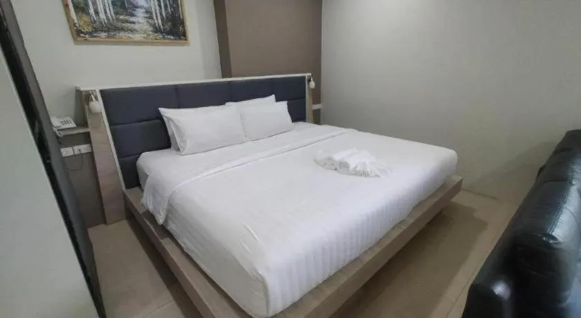 Bed in Sattahip 9 Boutique Hotel