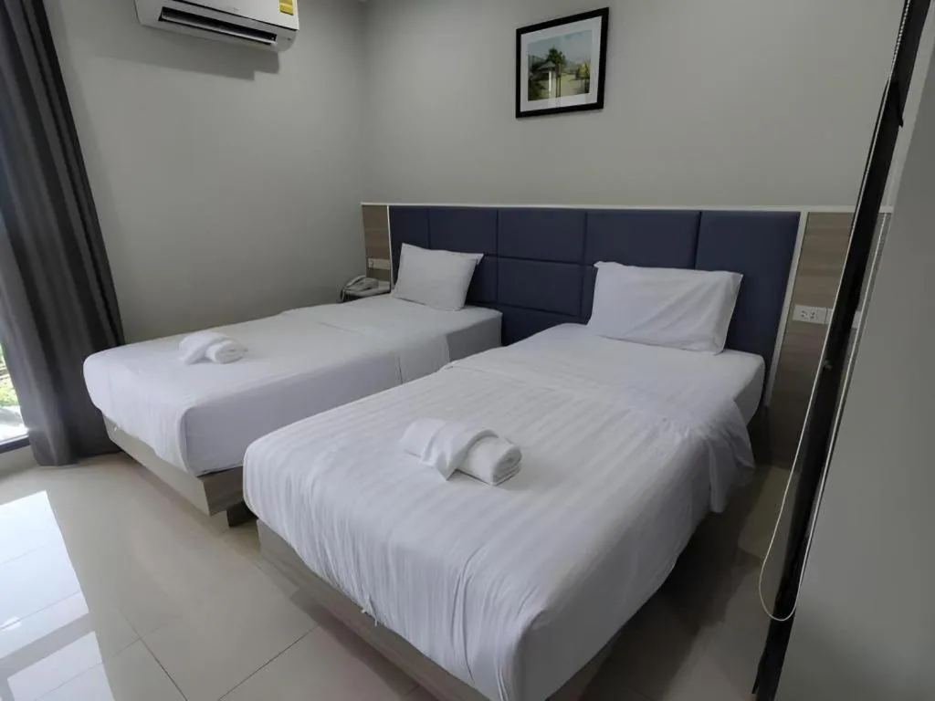 Bed in Sattahip 9 Boutique Hotel