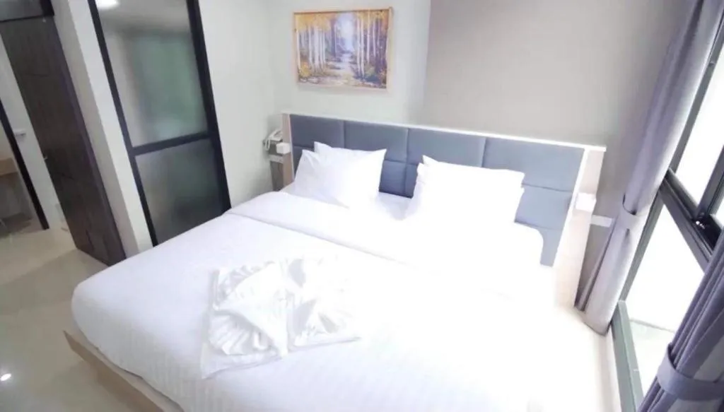 Bed in Sattahip 9 Boutique Hotel