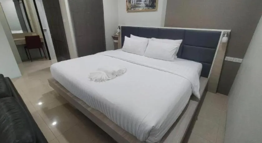 Bed in Sattahip 9 Boutique Hotel