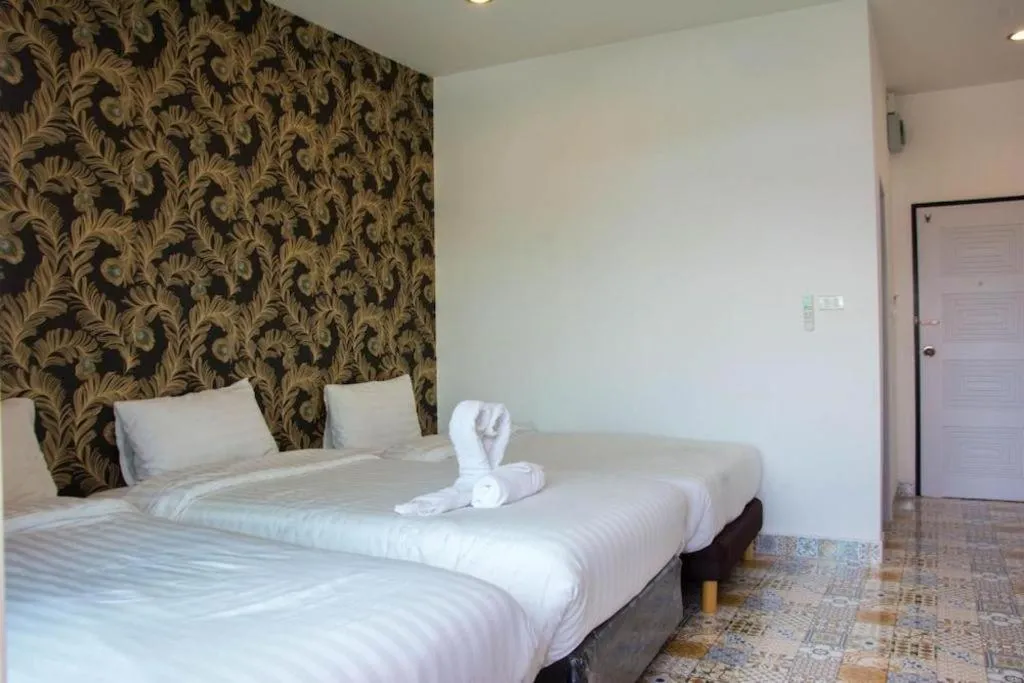 Bed in Oasis Hiso Hotel