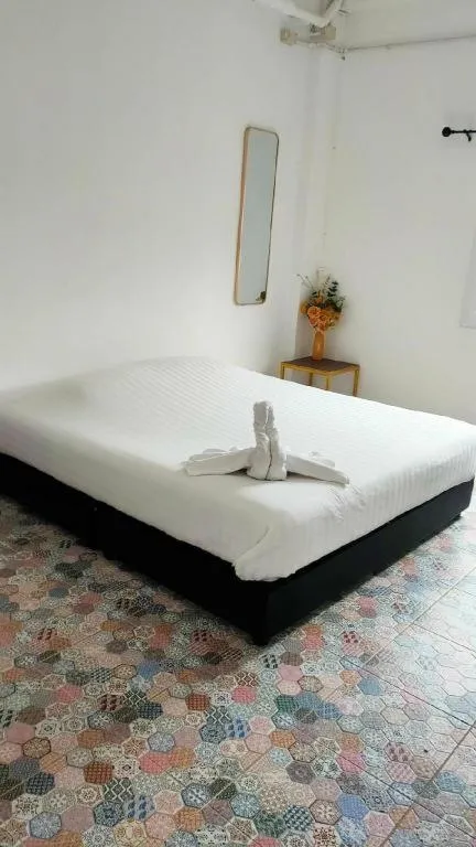 Bed in Oasis Hiso Hotel