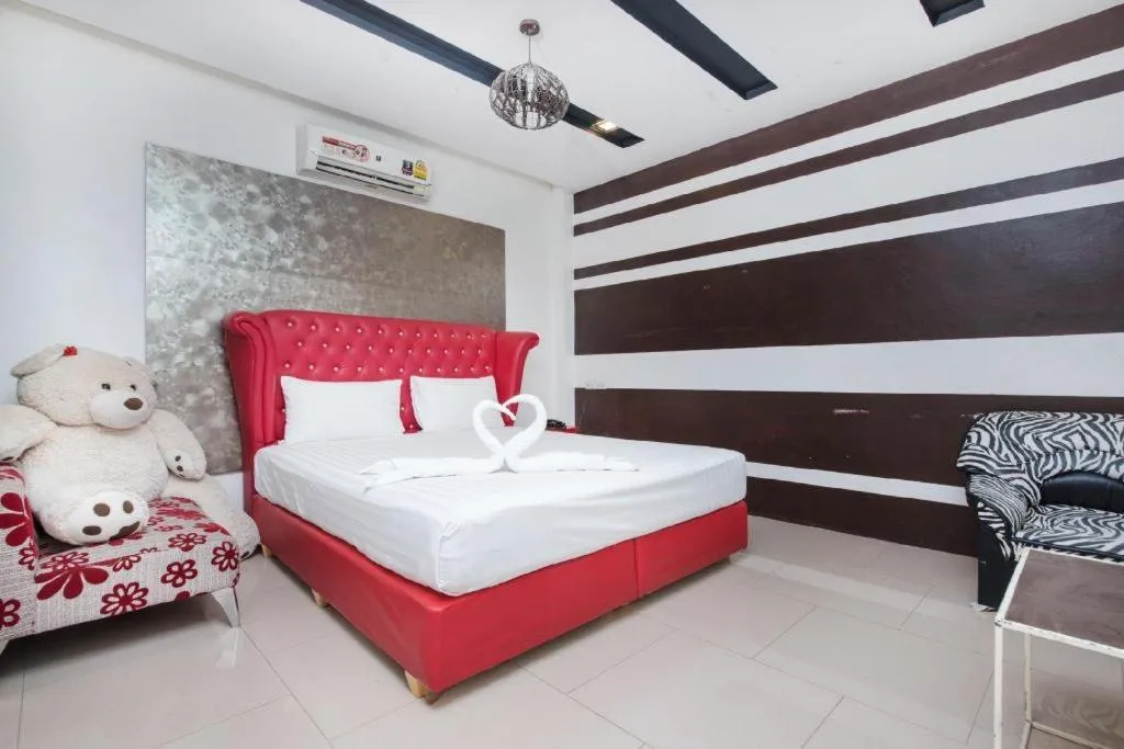 Bed in Oasis Hiso Hotel