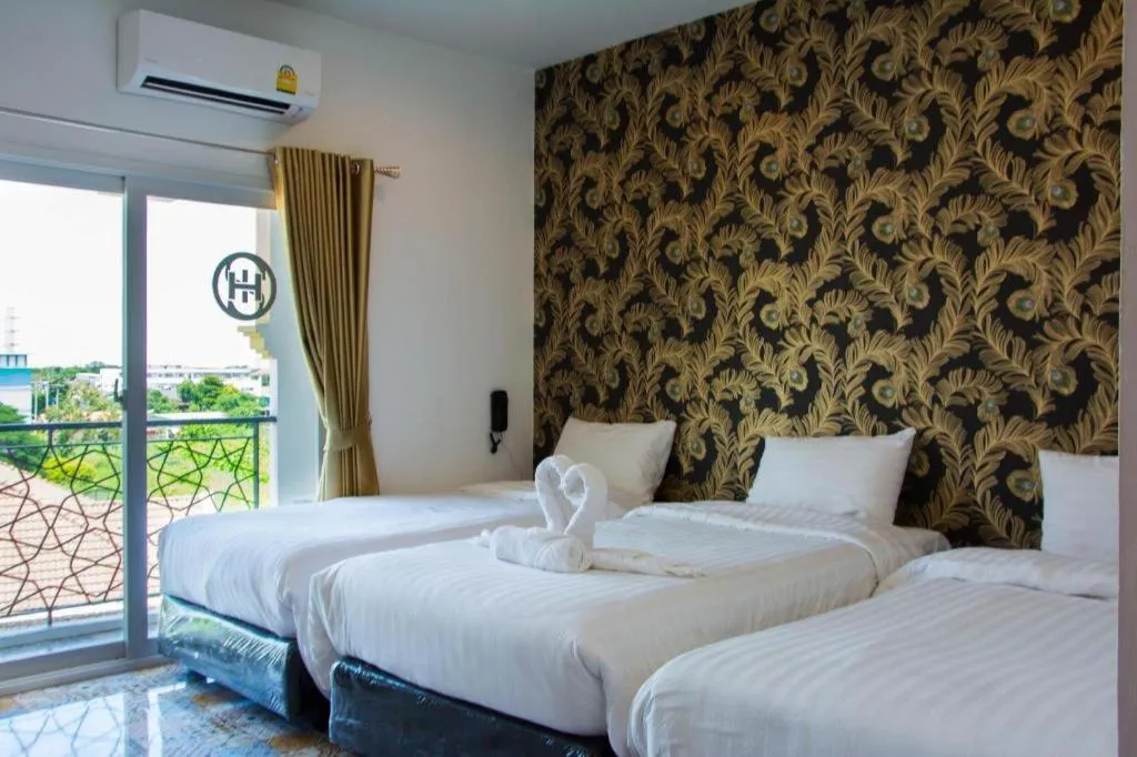 Bed in Oasis Hiso Hotel