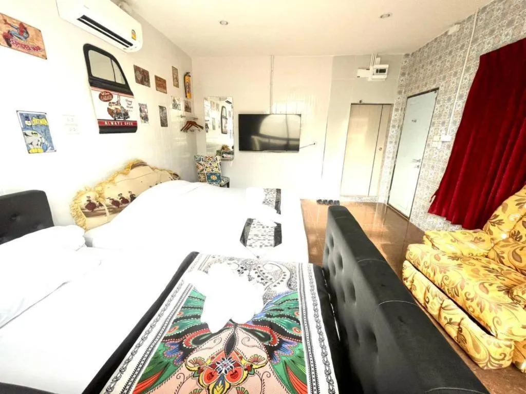 Bed in Oasis Hiso Hotel