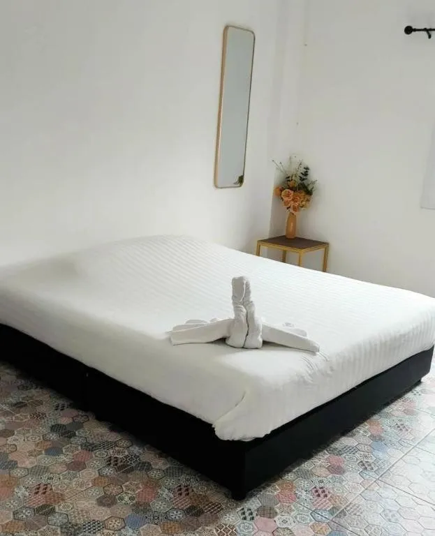 Bed in Oasis Hiso Hotel