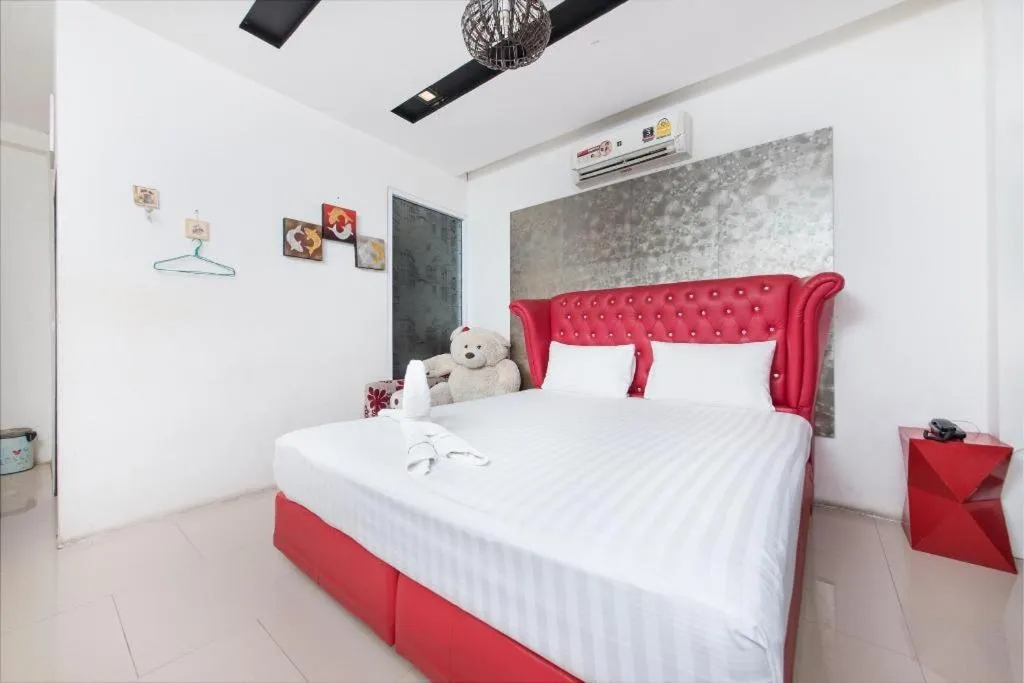 Bed in Oasis Hiso Hotel