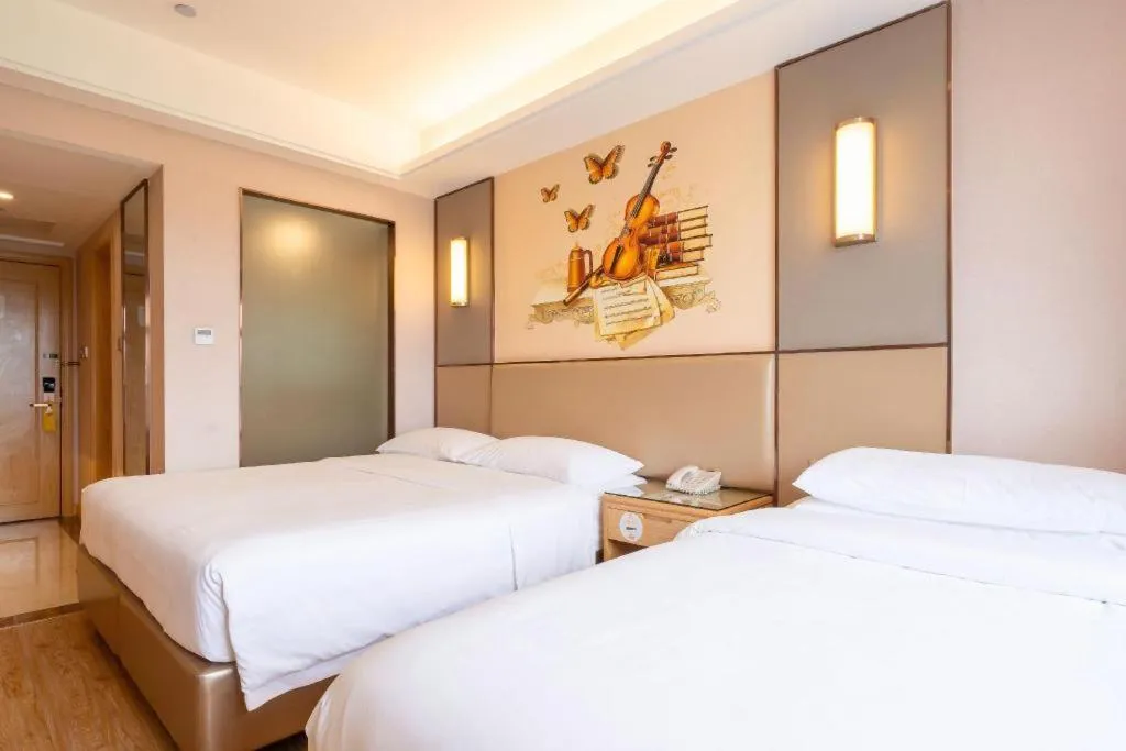 Bed in Vienna Hotel Nanning Xiangsi Lake University Town