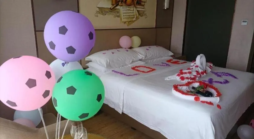 Bed in Vienna Hotel Nanning Xiangsi Lake University Town