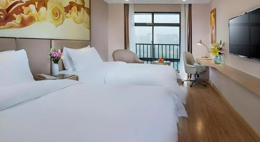 Bed in Vienna Hotel Nanning Xiangsi Lake University Town