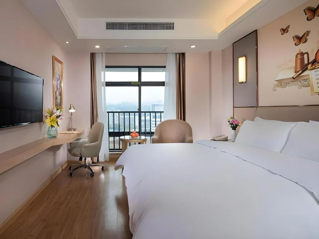 Bed in Vienna Hotel Nanning Xiangsi Lake University Town