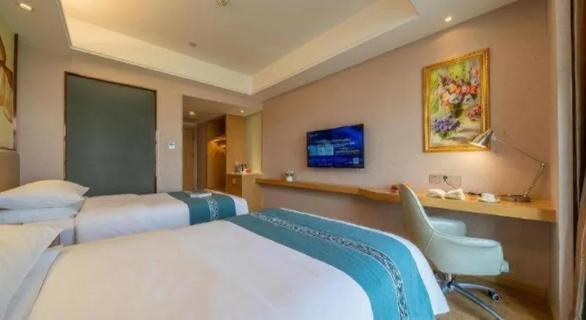 Bed in Vienna Hotel Nanning Xiangsi Lake University Town