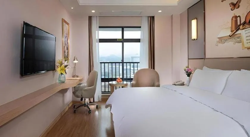 Bed in Vienna Hotel Nanning Xiangsi Lake University Town