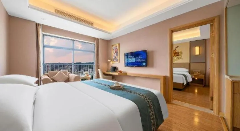 Bed in Vienna Hotel Nanning Xiangsi Lake University Town