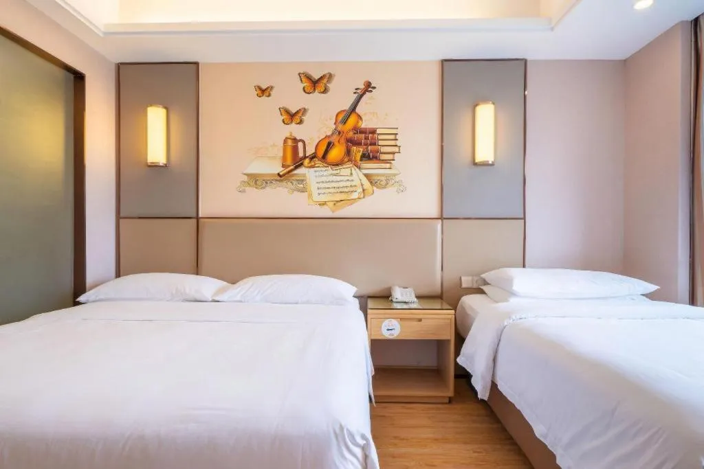 Bed in Vienna Hotel Nanning Xiangsi Lake University Town