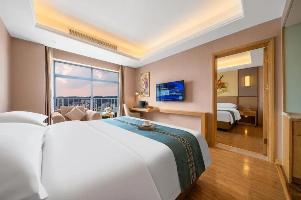 Bed in Vienna Hotel Nanning Xiangsi Lake University Town