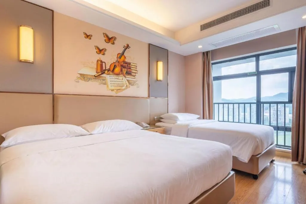 Bed in Vienna Hotel Nanning Xiangsi Lake University Town