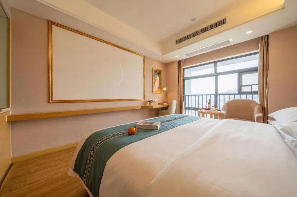 Bed in Vienna Hotel Nanning Xiangsi Lake University Town